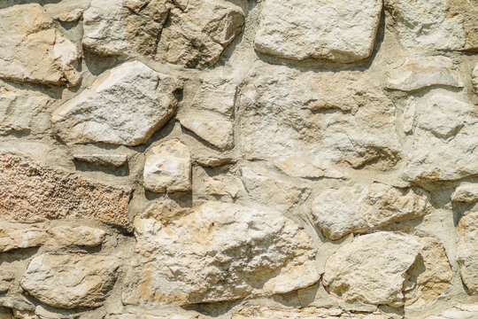 Rough stone wall texture from old castle ruins closeup detailed material for PBR real photography