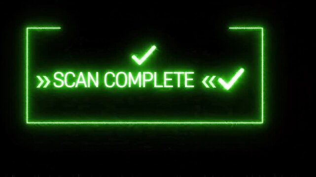 Futuristic scan complete message on glowing green digital interface