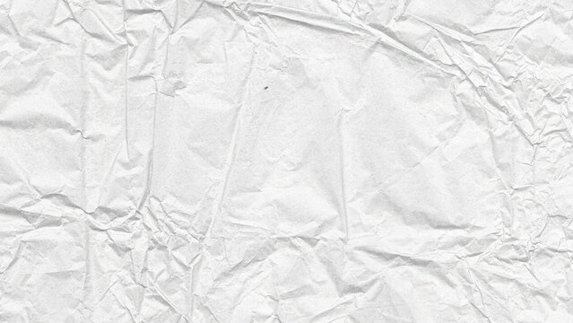 Full frame white crumpled paper texture with subtle folds and creases, crumpled