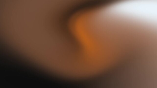 Abstract swirling warm gradient background with soft diffused light and smooth flowing curves in elegant earth tones