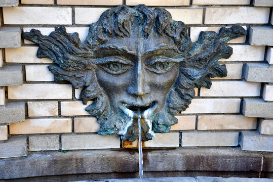 Art Nouveau Bronze Mascaron Wall Fountain on Brick Wall