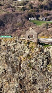 Aerial view of the remaining wall of the old coastguard station in Teelin, County Donegal, Ireland