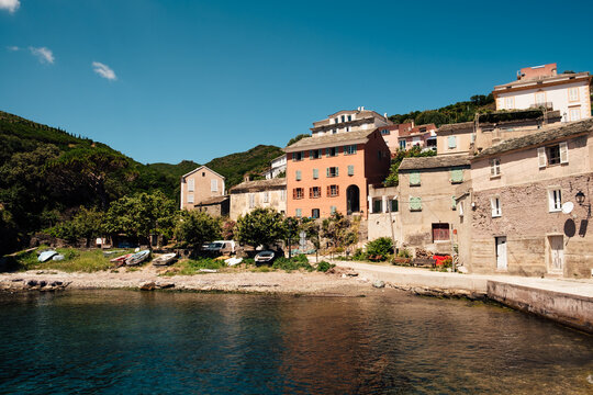 Small boats in a tiny coastal village along the Mediterranean sea