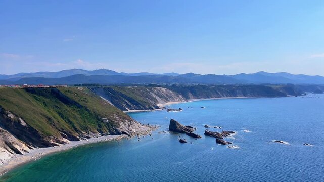 scenic aerial view of cliffs beach and ocean coast in asturias spain