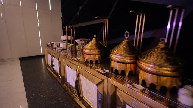 Luxury gold buffet chafing dishes setup for wedding catering in Delhi NCR India
