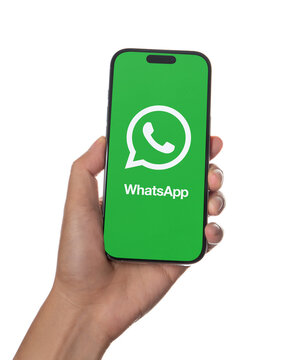 Kuala Lumpur, Malaysia - August 9, 2026: Hand holding a smartphone displaying WhatsApp app logo on screen