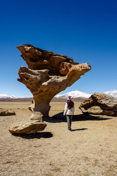 Woman beside the &Aacute;rbol de Piedra stone tree, Siloli Desert, Potos&iacute;, Bolivia
