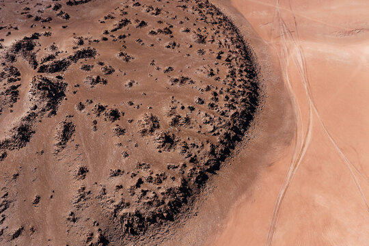 Abstract aerial view of a lava field edge in the altiplano desert, Sud L&iacute;pez, Potos&iacute;, Bolivia