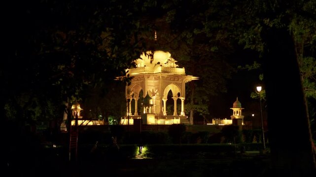 Dynamic footage showcasing the vibrant essence of Lucknow, the capital of Uttar Pradesh. Capture sweeping shots of iconic Mughal and Awadhi architecture such as the Bara Imambara, Rumi Darwaza, and Ch