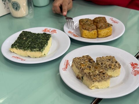 Bandung, Indonesia - July 22, 2026: Various tofu dish (steamed tofu with mushroom, fried tofu with chicken, steamed tofu with chives) served on the table from Toko Tahu Priangan restaurant