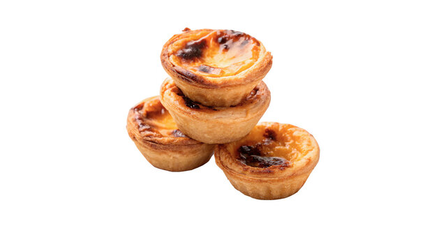 Stack of traditional portuguese pastel de nata custard tarts isolated on transparent background cut out