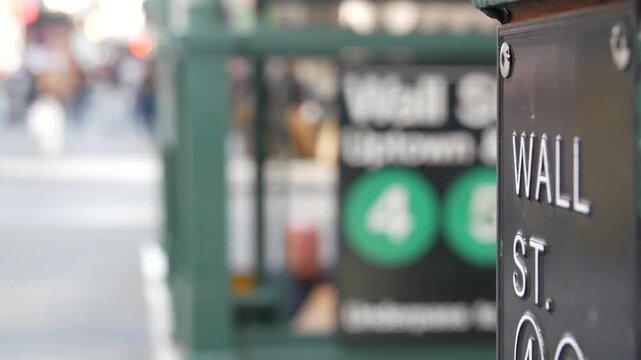 New York City Broadway subway, metro entrance sign, Wall Street, United States. American underground, Manhattan Downtown transport. Metropolitan station in Financial District. People pedestrian, FiDi.
