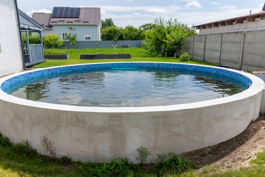 The water in the pool is dirty. Selective focus.