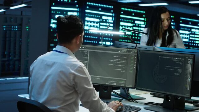 Cybersecurity team monitors cybersecurity risks in a technical server room, connecting network security, data protection and regulatory compliance as part of a practical technical workflow