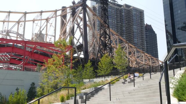New York City Manhattan Midtown, Queensboro bridge architecture, United States. Urban transport metallic bridge to Queens and Roosevelt island, East River. Esplanade in East Side. Urban promenade park