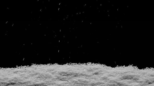 Snow falls on a wooden floor with a pile of snow