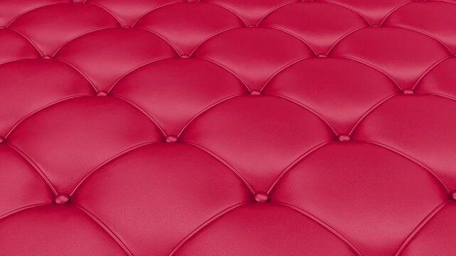 Close view of a red tufted leather surface with stitched diamond-style padding and gentle perspective motion, creating a luxurious upholstered texture background, 3D animation