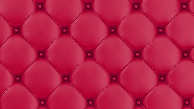 Close view of red quilted leather upholstery with button tufting and diamond pattern, forming a luxury padded background with subtle lateral movement, loop 3d animation