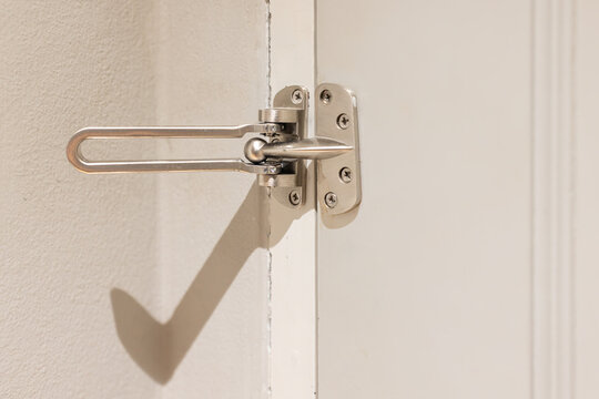 Swing bar door guard (Hotel Latch) is open.