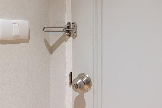 Swing bar door guard (Hotel Latch) is open.