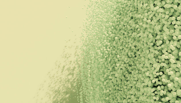 3d rendering of densely packed green spheres with scattered particles