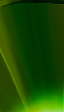An abstract green light waves background with flowing gradient rays