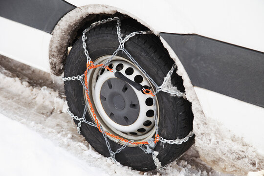 Germany, Locked car tyre in snow