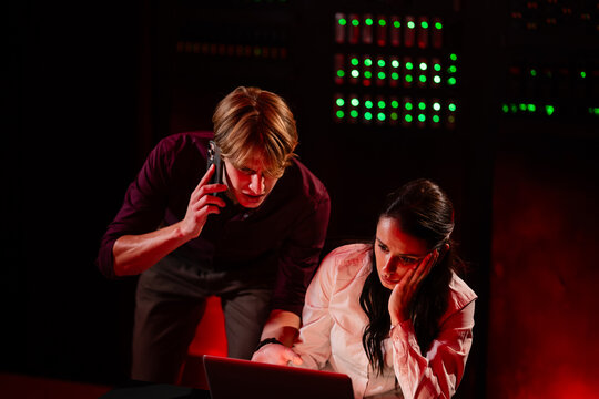 Cybersecurity team reacting to urgent data center crisis
