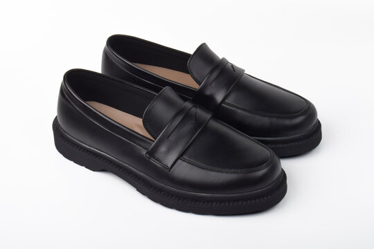 Black Leather Loafers Pair Isolated on White Background