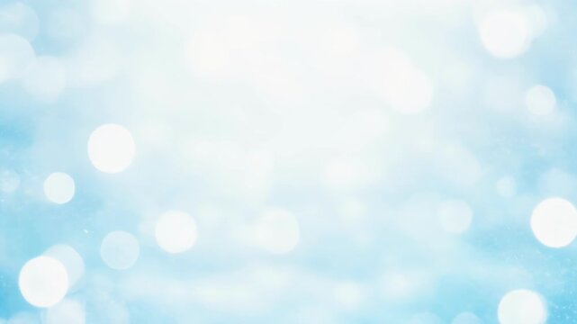 Abstract light blue bokeh background with soft glowing circles