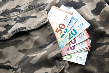 Obraz premium Cash for the military, euro banknotes. 