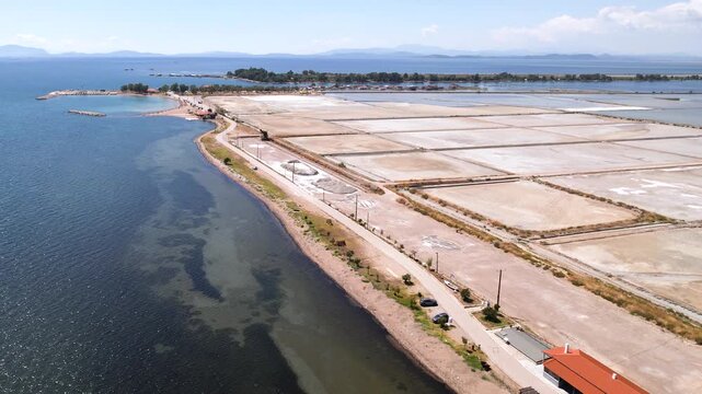 Aerial Wide Shot in Tourlida Salterns Messolonghi Greece, Salt Flats and Beach View