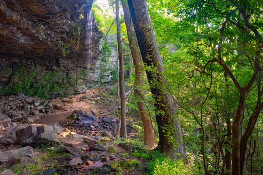 Hiking trail under a cliff overhang where Keown Falls plunges when water volume is high enough, Chattahoochee National Forest, Georgia
