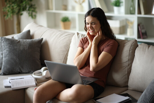 Student complaining suffering tmj studying online at home