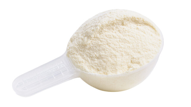 Plastic scoop filled with fine white powder
