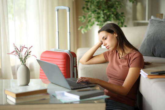 Bored teleworker working during business travel