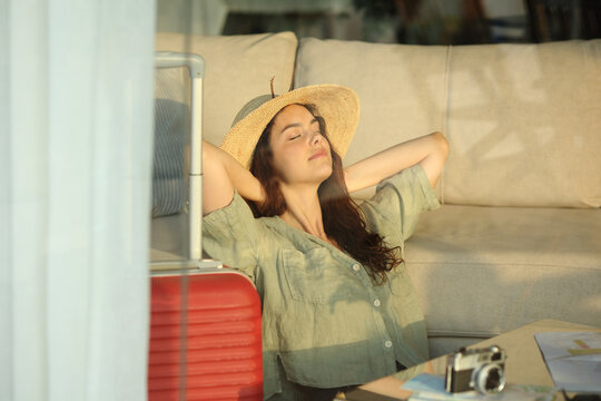 Tourist relaxing enjoying vacation in an hotel room