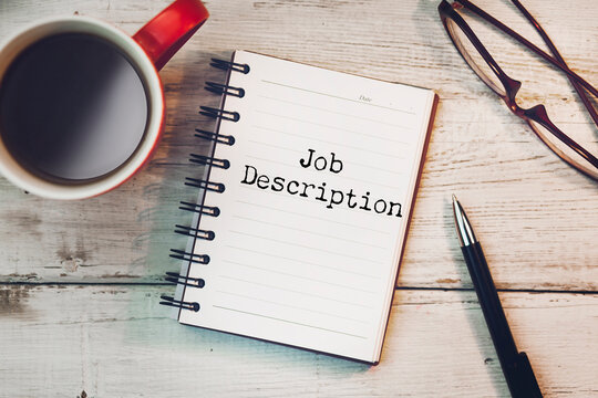 open notebook with the words Job Description