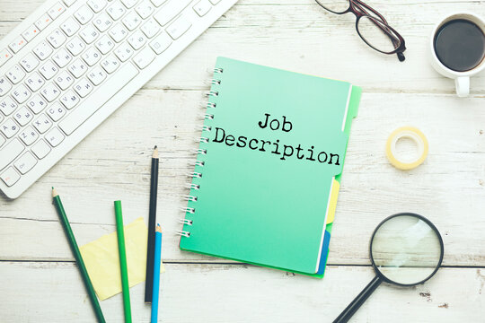 open notebook with the words Job Description