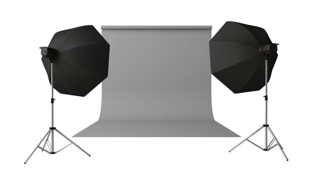 Studio lighting setup with softboxes and grey backdrop