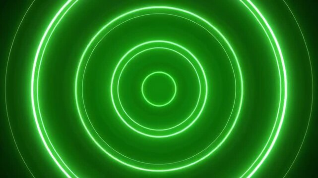 Pulsing green concentric circles animate with subtle zoom effect on black background