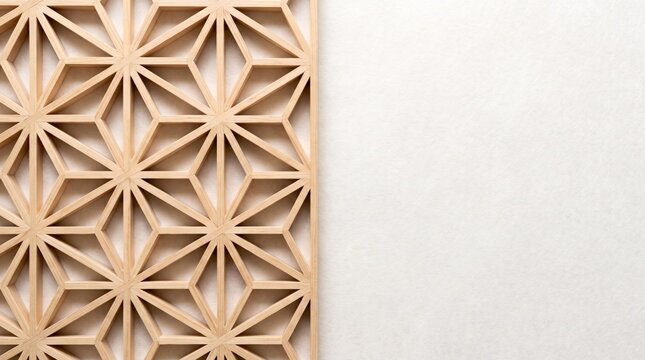 Traditional Japanese kumiko woodcraft lattice screen with delicate asanoha pattern and copy space