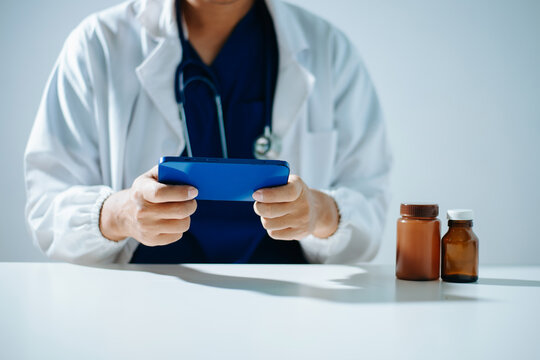 Professional healthcare worker calculating finance and budget data on a calculator. Medical accounting for cost analysis