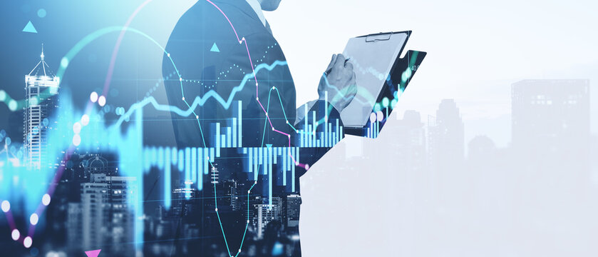 Financial analyst with tablet and rising market charts over Manh