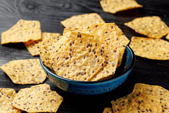 Seeded Tortilla Crackers in a Blue Bowl