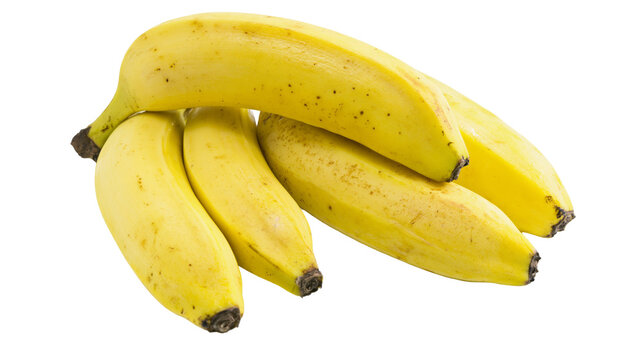 Bunch of ripe yellow bananas with brown spots