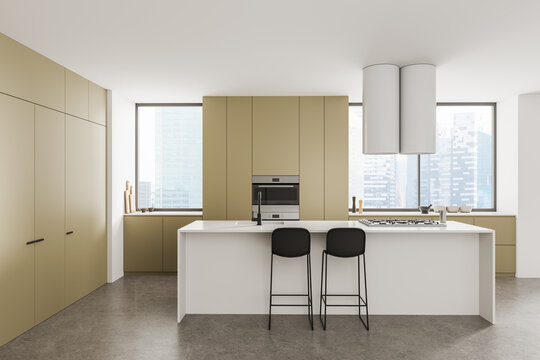 Modern minimalist kitchen interior with warm beige cabinetry, white island, pendant lights, built-in appliances, and city skyline windows. 3D Rendering