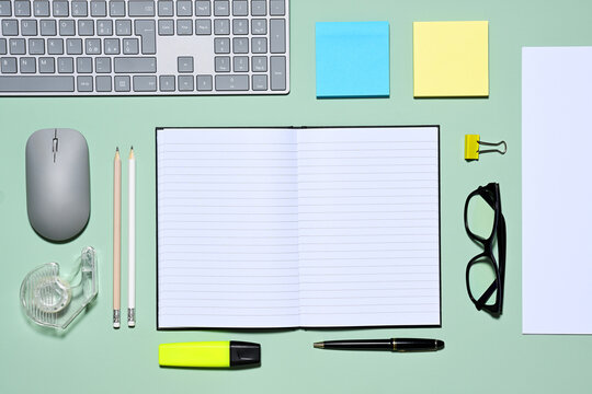 Office items on green background