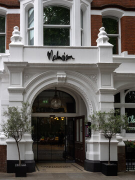 LONDON, UK - JULY 14, 20026:  Entrance to Malmaison Hotel in Charterhouse Square, Farringdon with sign