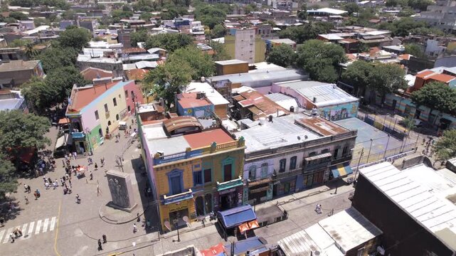 4K drone aerial view of Caminito in La Boca, Buenos Aires, Argentina. Colorful streets, historic buildings and one of the city&rsquo;s most iconic cultural and tourist attractions.